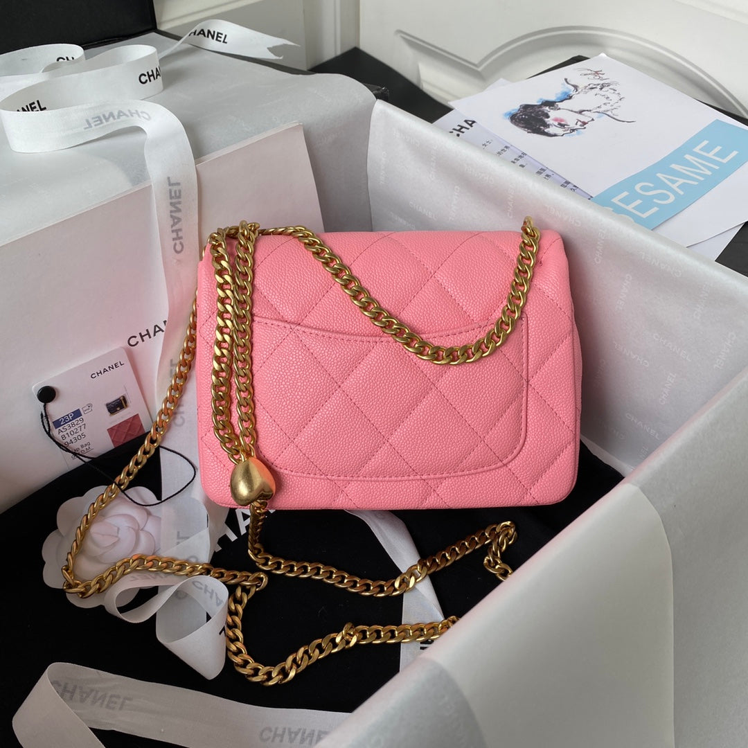 Chanel Pink Quilted Mini Flap Bag with Gold Hardware and Heart Charm