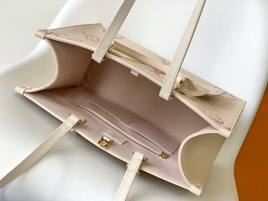 Louis Vuitton Women's OnTheGo MM Monogram Empreinte Leather Tote Bag - Cream/Pink