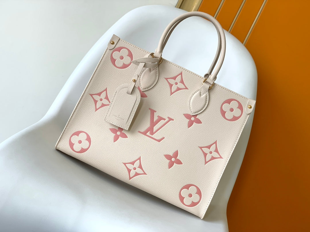 Louis Vuitton Women's OnTheGo MM Monogram Empreinte Leather Tote Bag - Cream/Pink