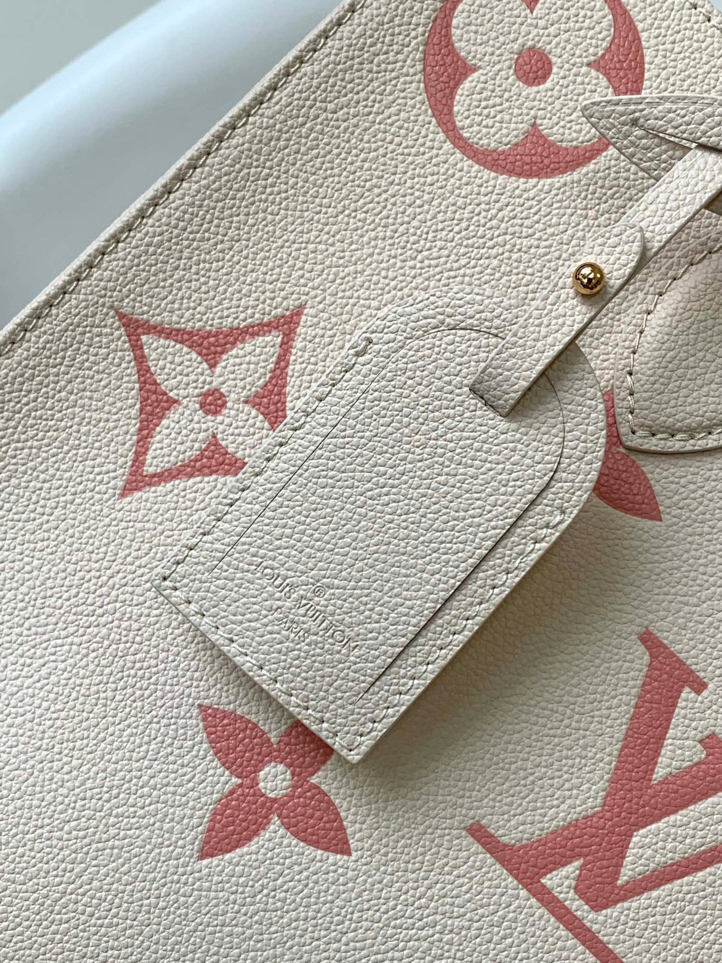 Louis Vuitton Women's OnTheGo MM Monogram Empreinte Leather Tote Bag - Cream/Pink