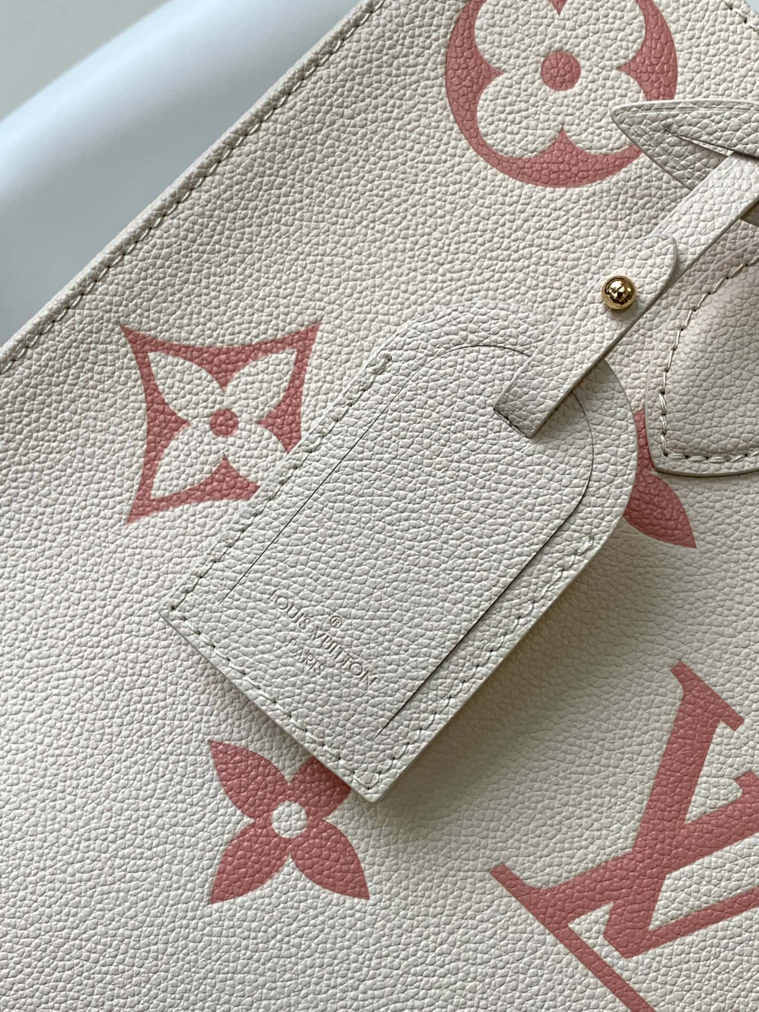 Louis Vuitton Women's OnTheGo MM Monogram Empreinte Leather Tote Bag - Cream/Pink