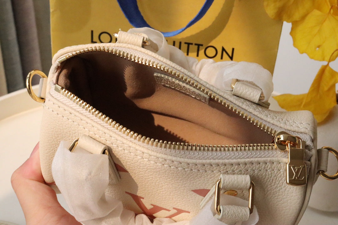 Louis Vuitton Nano Speedy Monogram Empreinte Leather Handbag - Cream/Pink