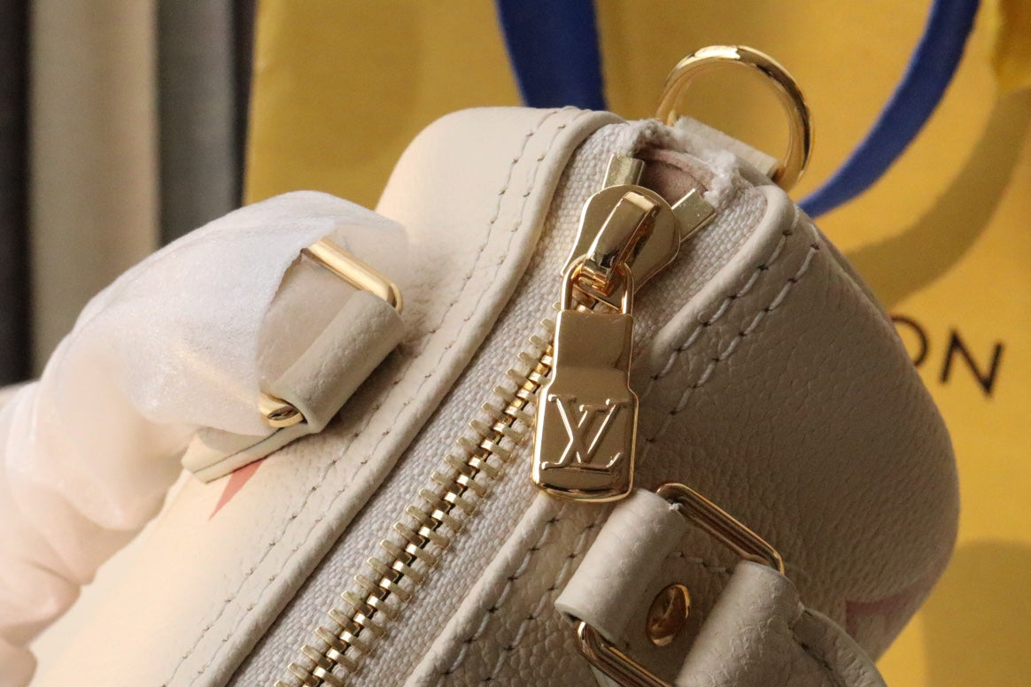Louis Vuitton Nano Speedy Monogram Empreinte Leather Handbag - Cream/Pink