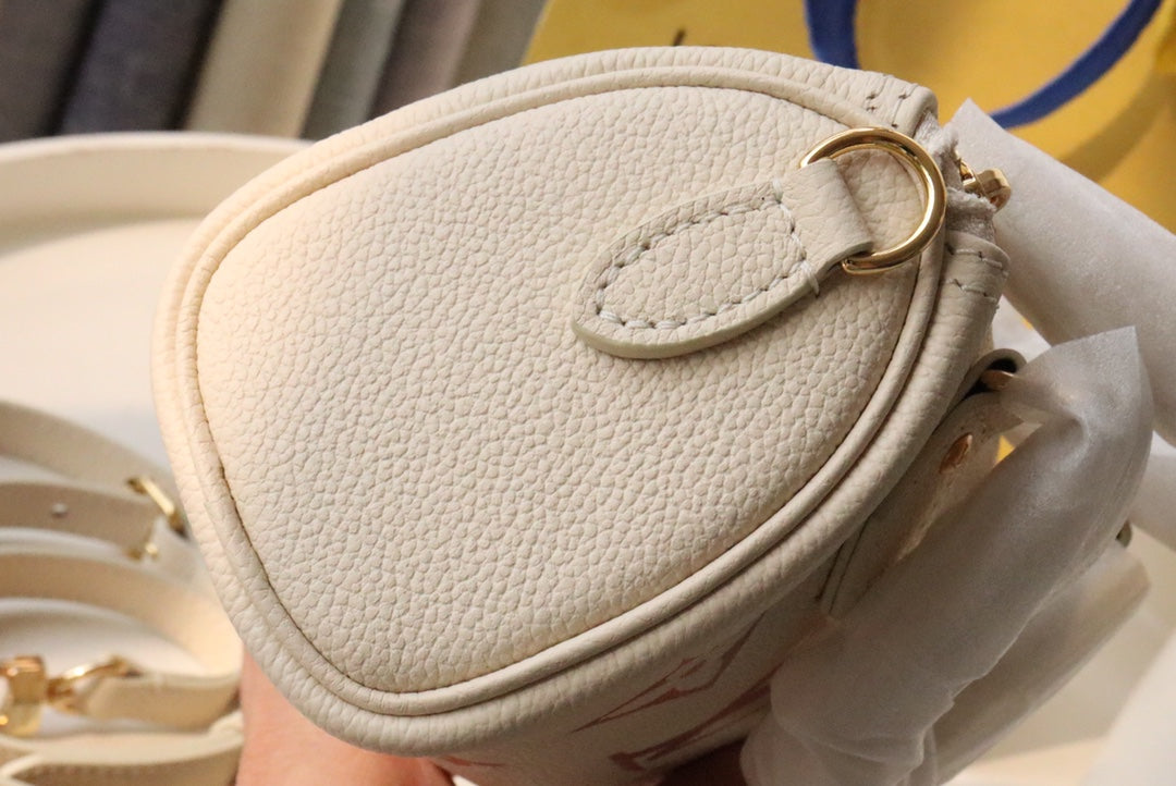 Louis Vuitton Nano Speedy Monogram Empreinte Leather Handbag - Cream/Pink