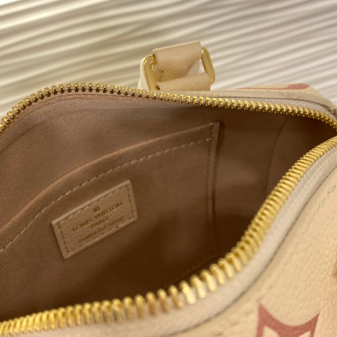 Louis Vuitton Nano Speedy Monogram Empreinte Leather Handbag - Bicolor Cream and Pink