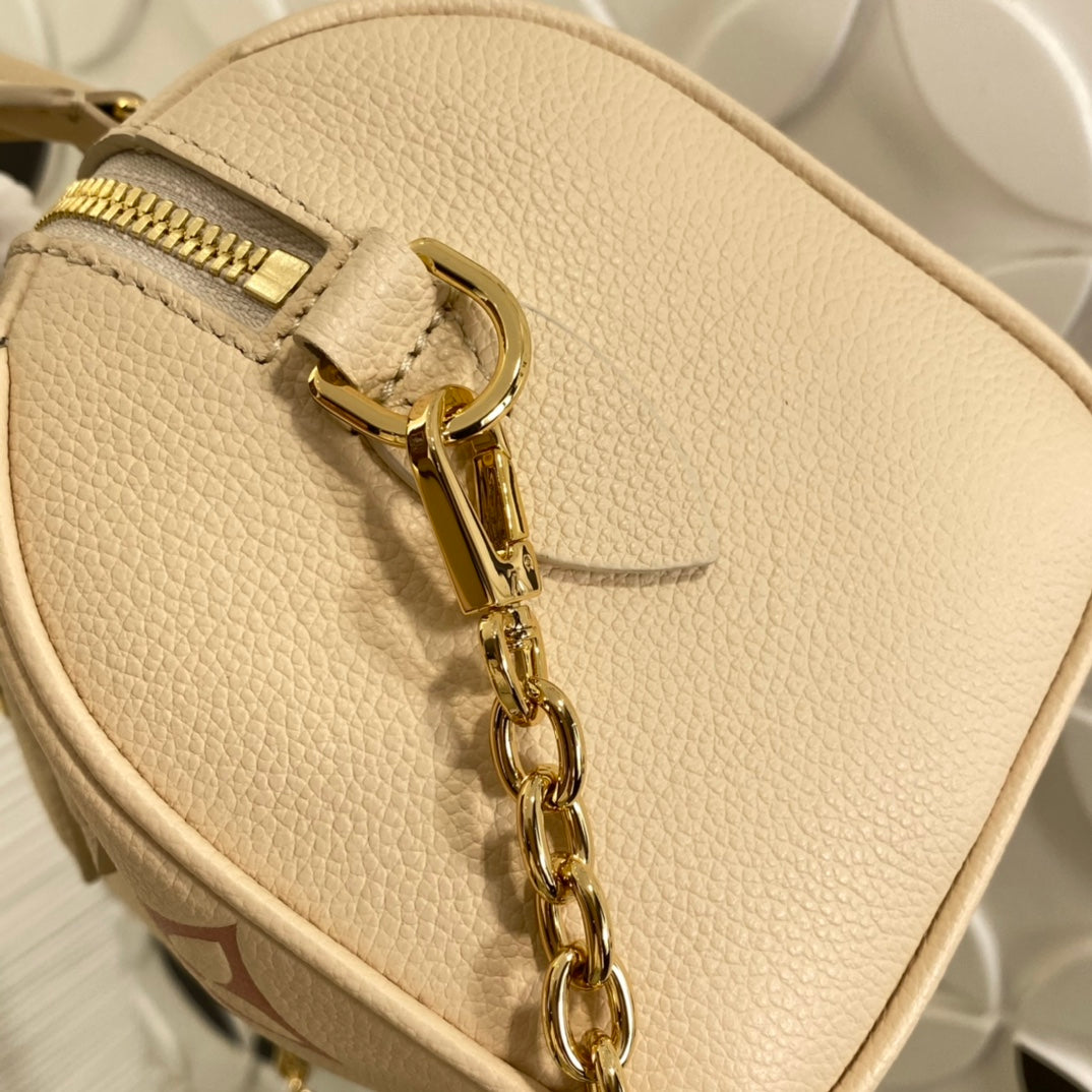 Louis Vuitton Nano Speedy Monogram Empreinte Leather Handbag - Bicolor Cream and Pink