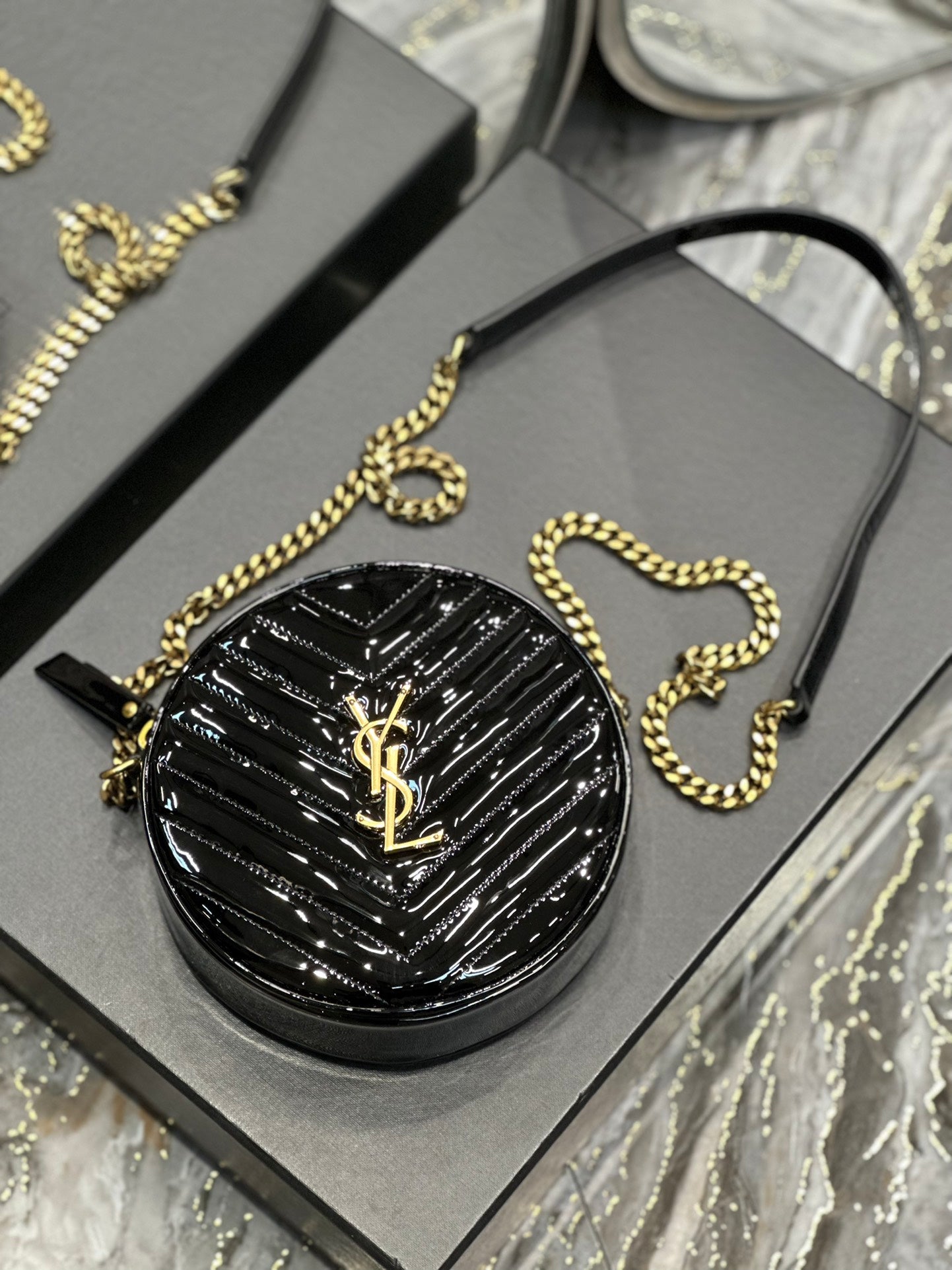 Saint Laurent Vinyle Round Camera Bag in Chevron-Quilted Leather - Black