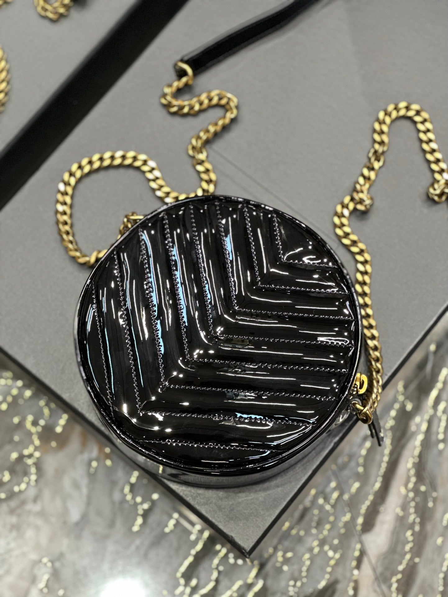 Saint Laurent Vinyle Round Camera Bag in Chevron-Quilted Leather - Black