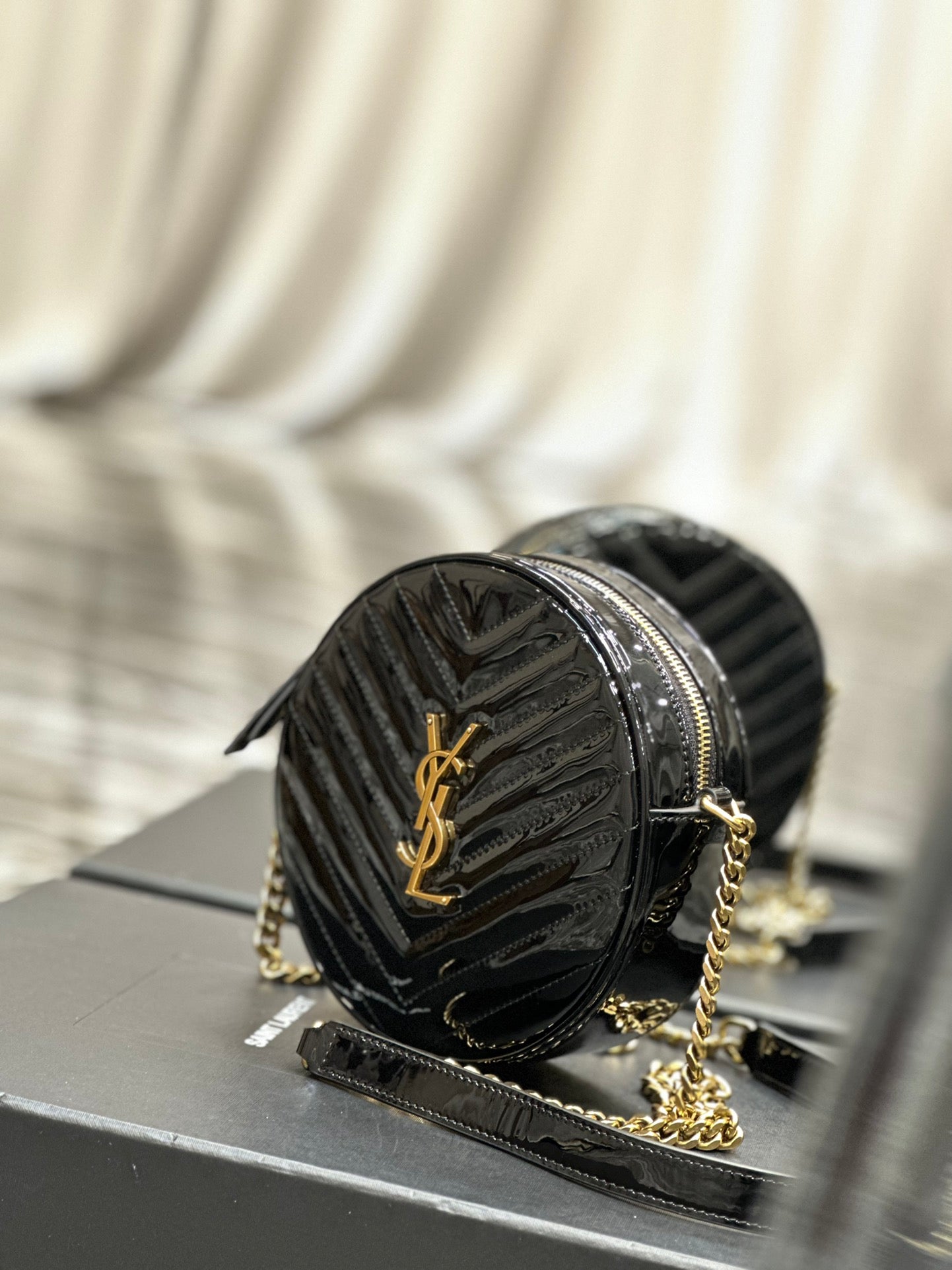 Saint Laurent Vinyle Round Camera Bag in Chevron-Quilted Leather - Black