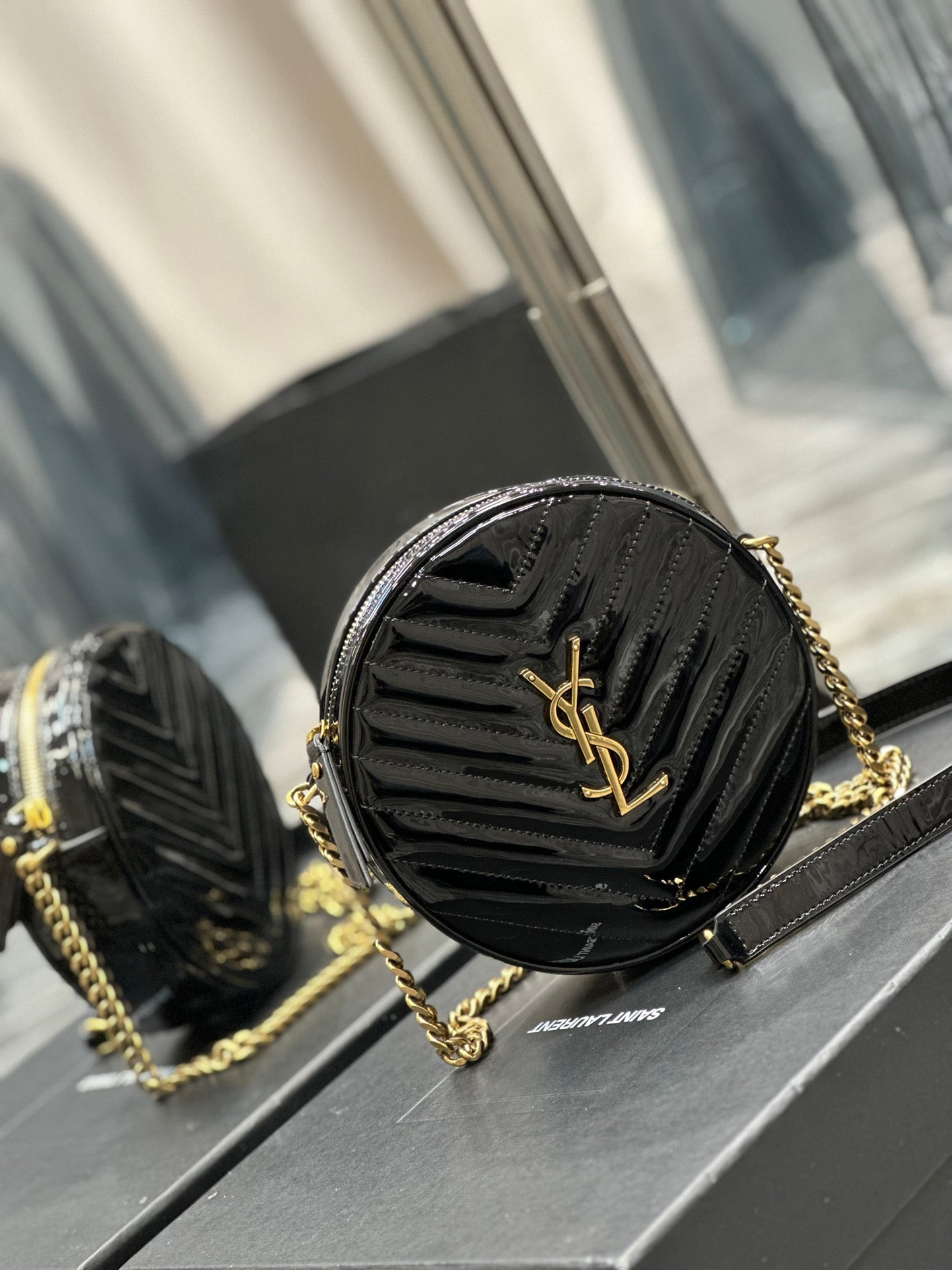 Saint Laurent Vinyle Round Camera Bag in Chevron-Quilted Leather - Black