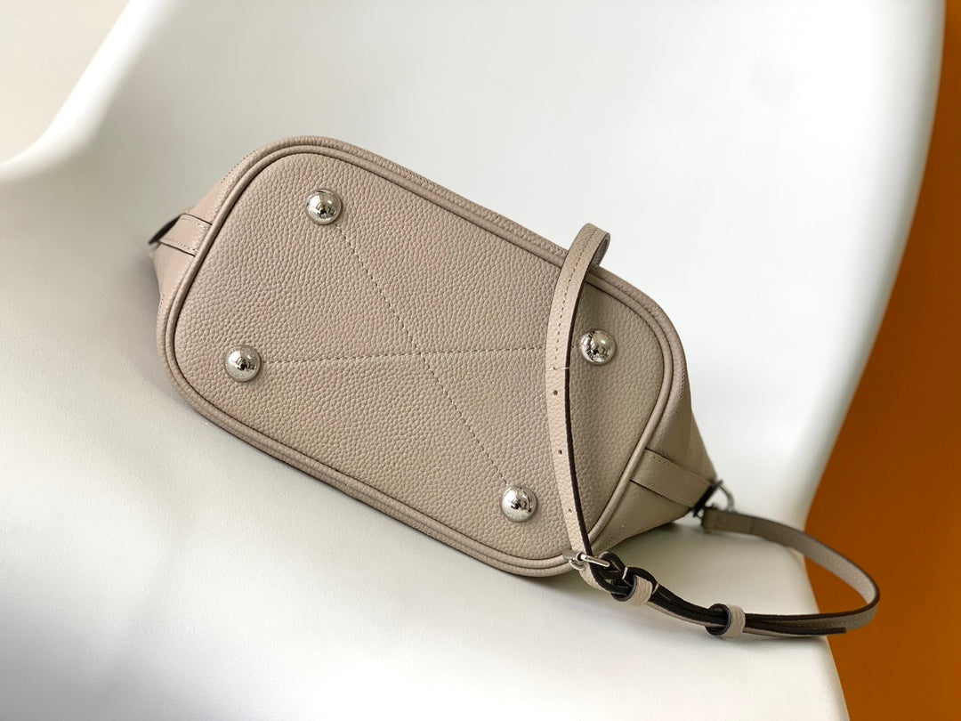 Louis Vuitton Muria Mahina Perforated Leather Bucket Bag - Galet