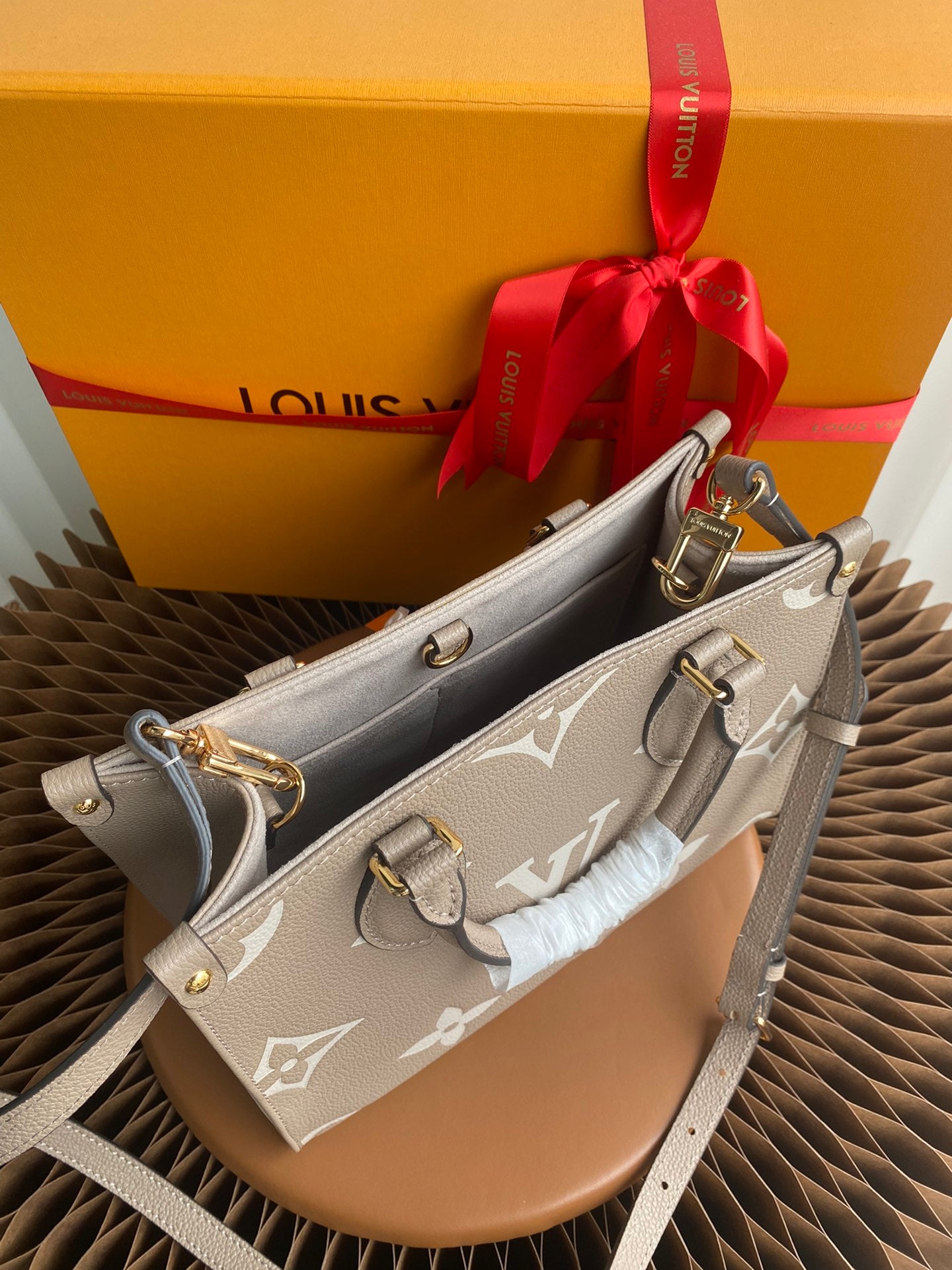 Louis Vuitton Onthego PM Monogram Empreinte Leather Tote Bag - Turtledove