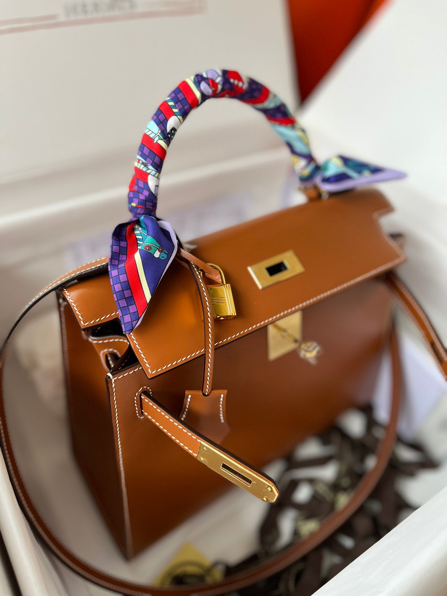 Hermès Kelly Bag Gold Leather with Gold Hardware and Twilly Scarf