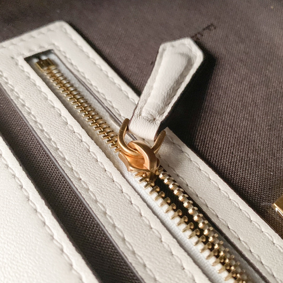 Fendi Baguette White Embossed FF Leather Shoulder Bag with Gold Hardware