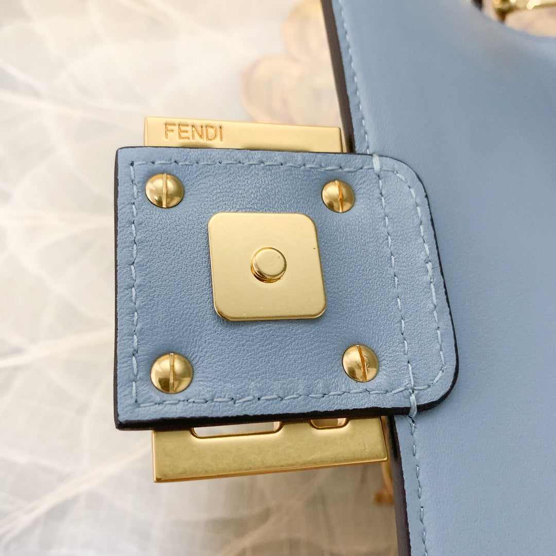 Fendi Light Blue FF Embossed Leather Baguette Bag with Gold Hardware