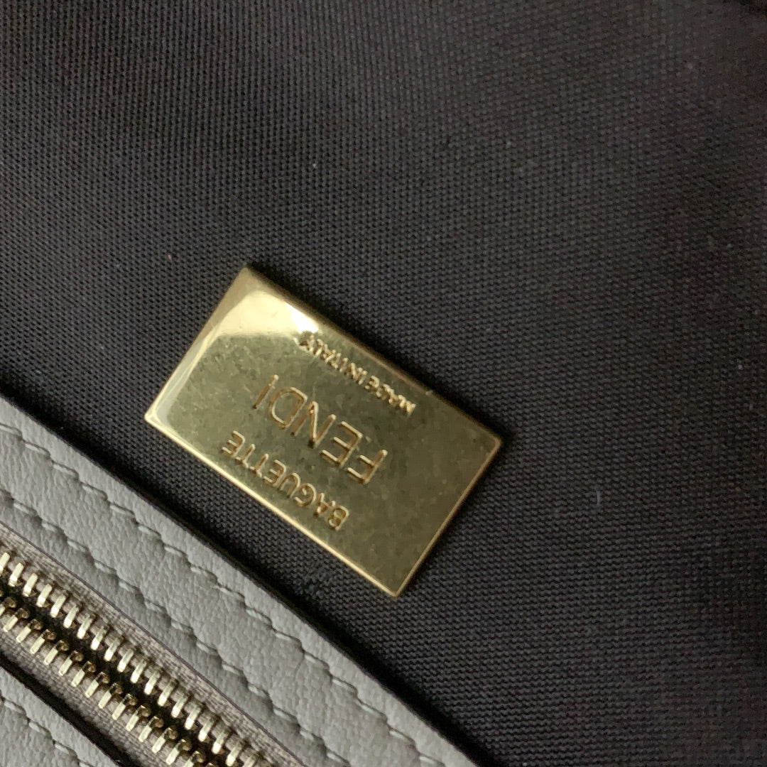 Fendi Baguette White FF Embossed Leather Shoulder Bag