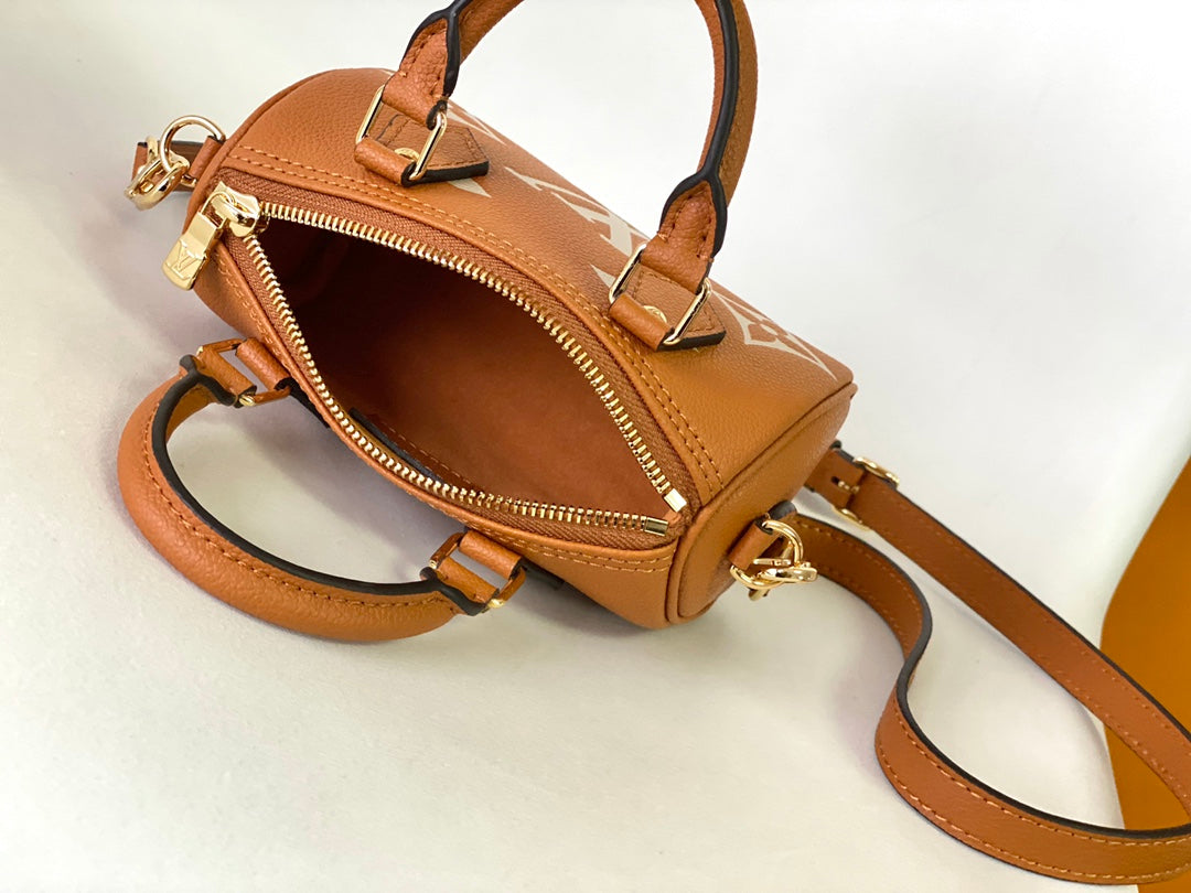 Louis Vuitton Nano Speedy Monogram Empreinte Leather Handbag - Bicolor Cognac