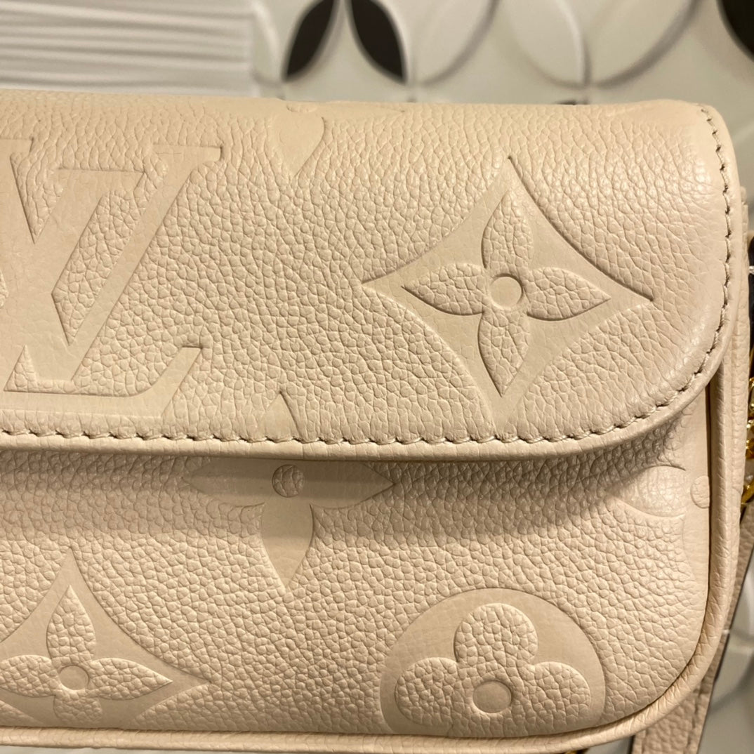 Louis Vuitton Lexington Pouch Monogram Empreinte Leather - Cream
