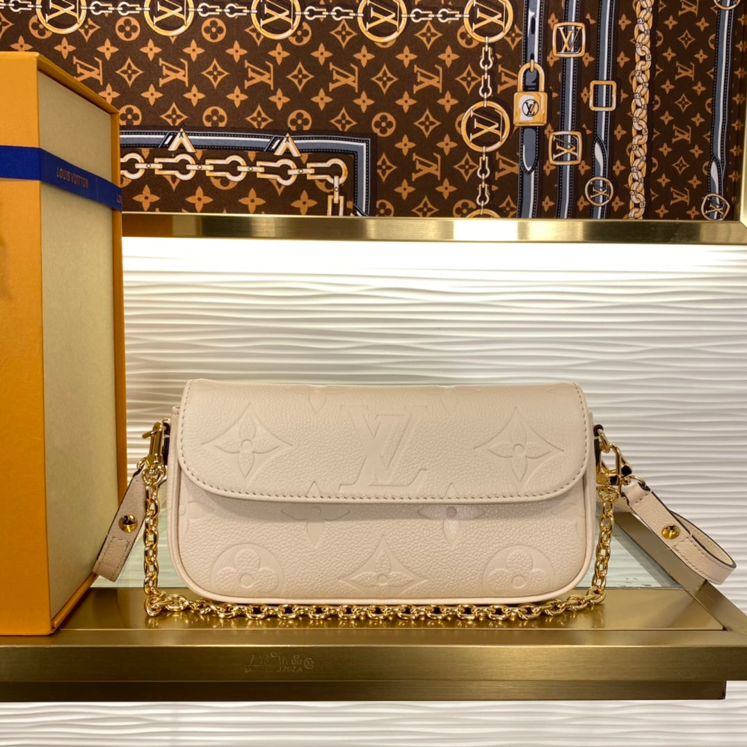 Louis Vuitton Lexington Pouch Monogram Empreinte Leather - Cream