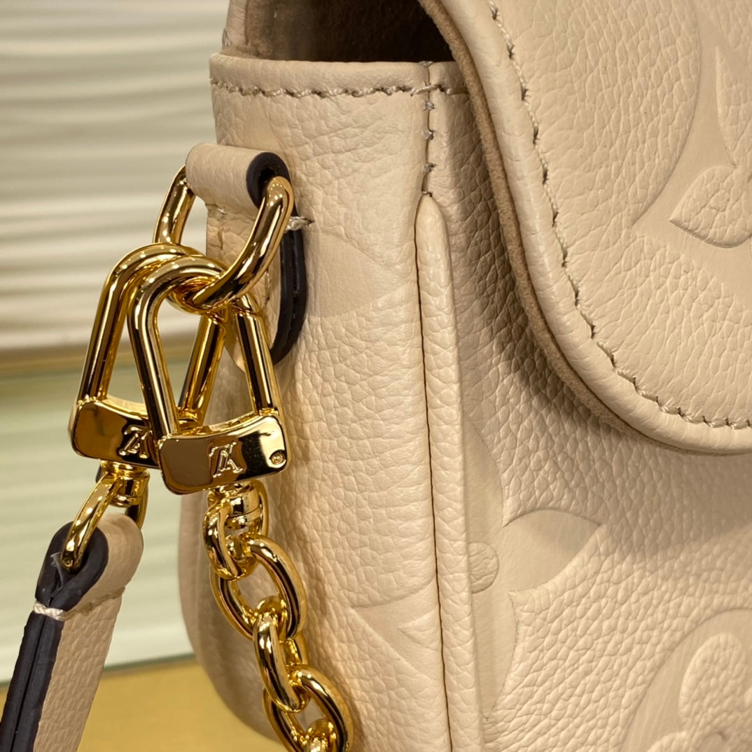 Louis Vuitton Lexington Pouch Monogram Empreinte Leather - Cream