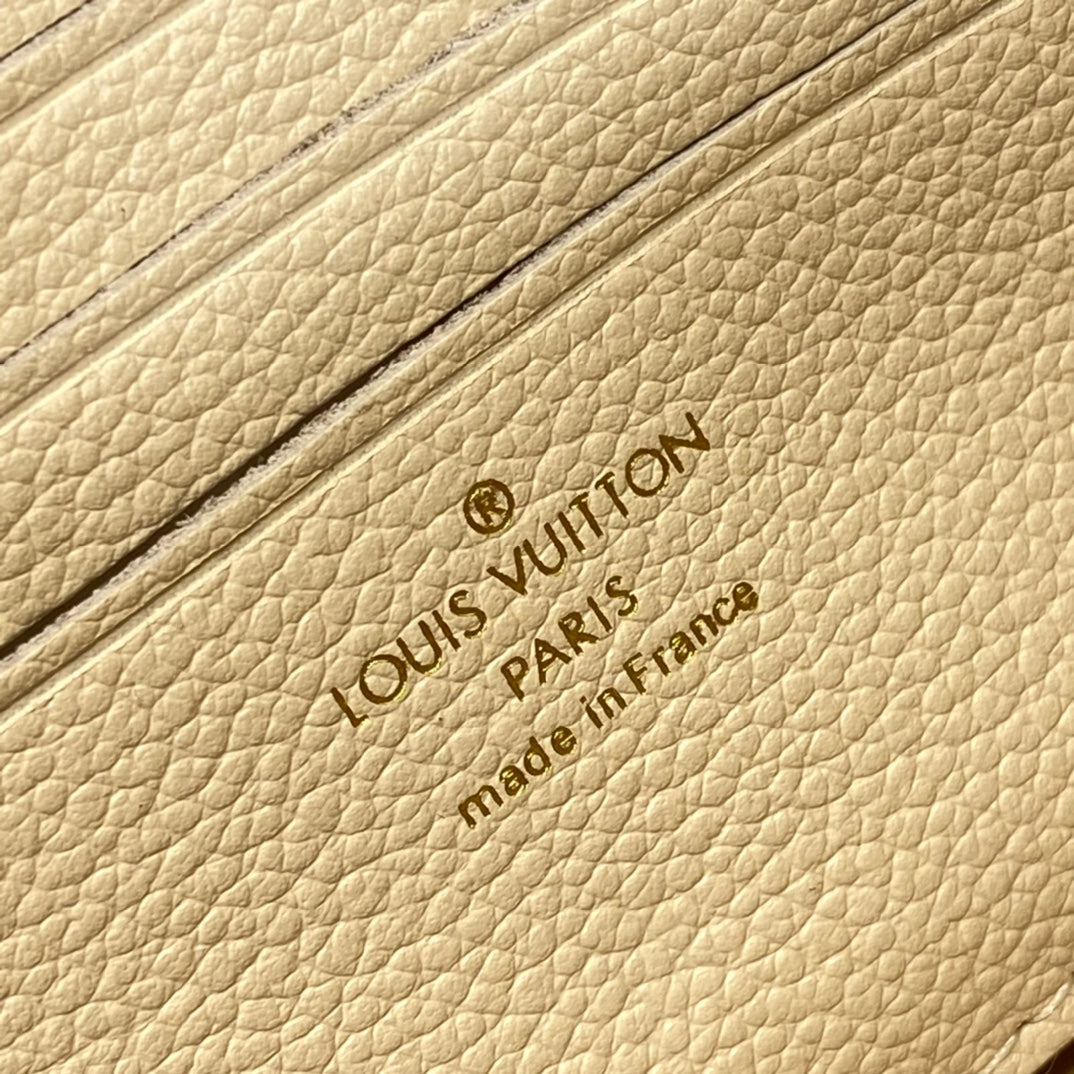 Louis Vuitton Lexington Pouch Monogram Empreinte Leather - Cream