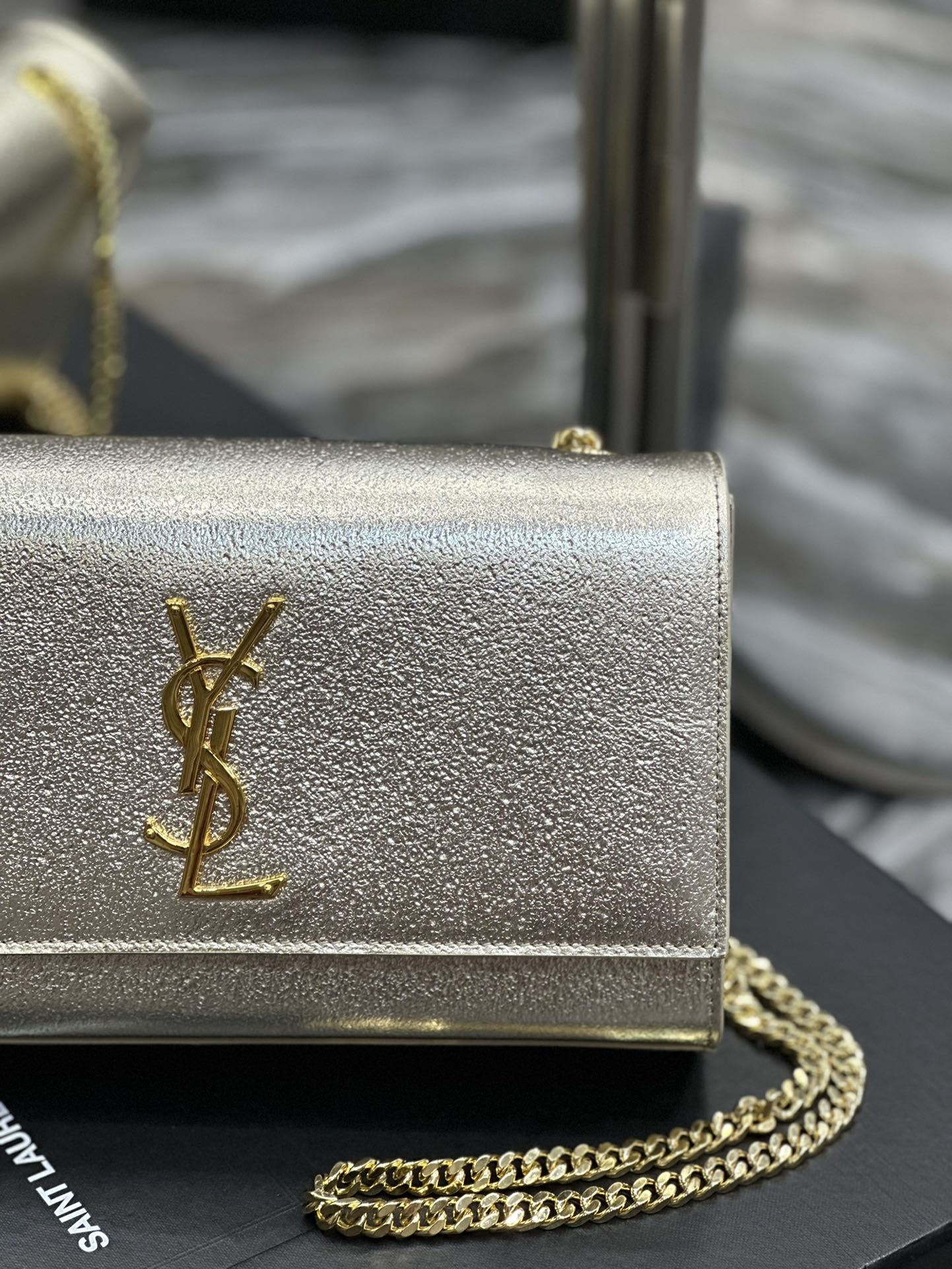 Saint Laurent Cassandre Chain Wallet in Metallic Gold Leather