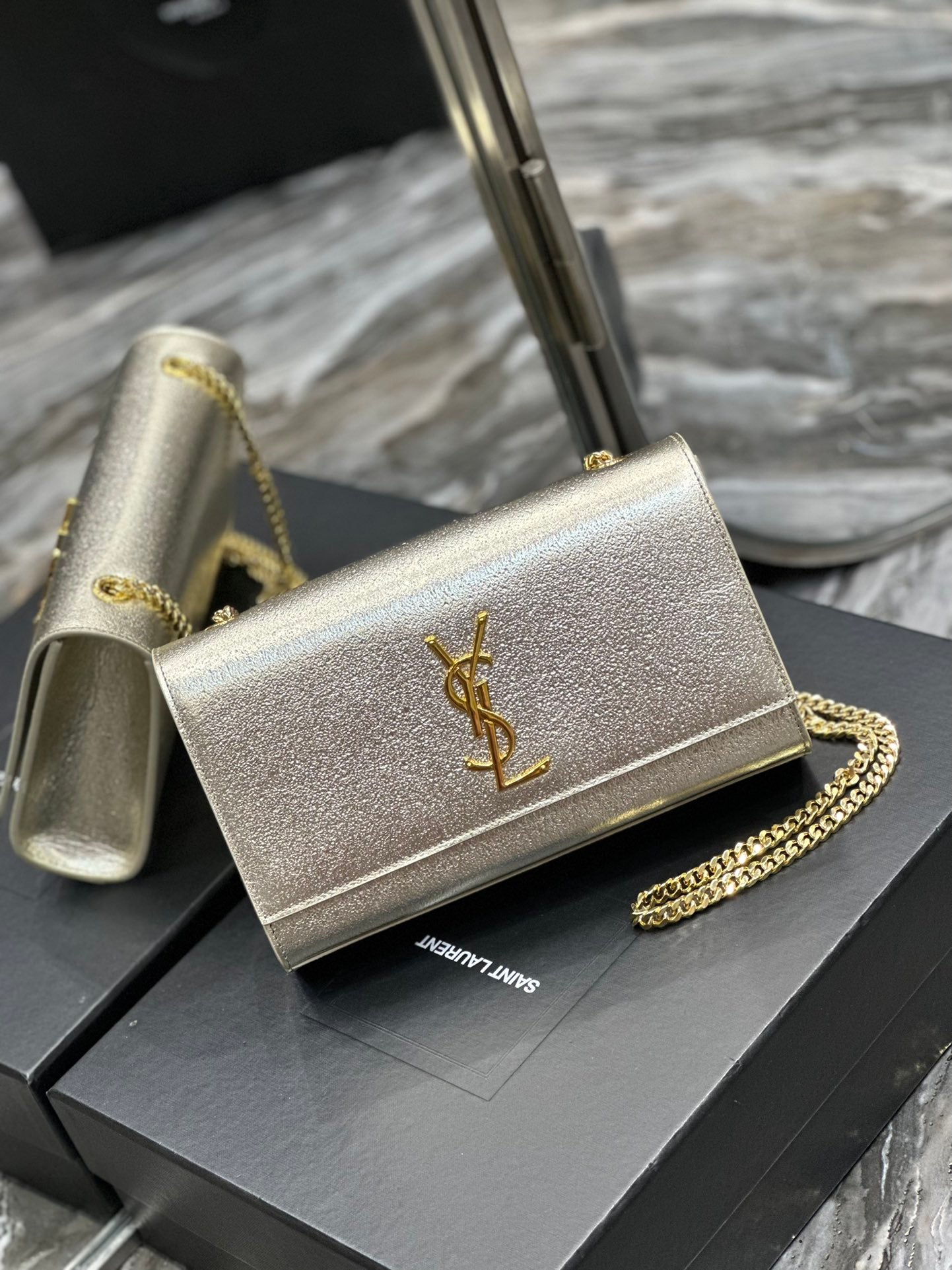 Saint Laurent Cassandre Chain Wallet in Metallic Gold Leather