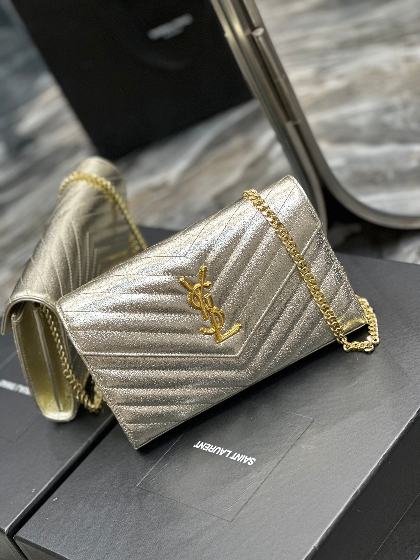 Saint Laurent Cassandre Matelassé Chain Wallet in Gold Leather