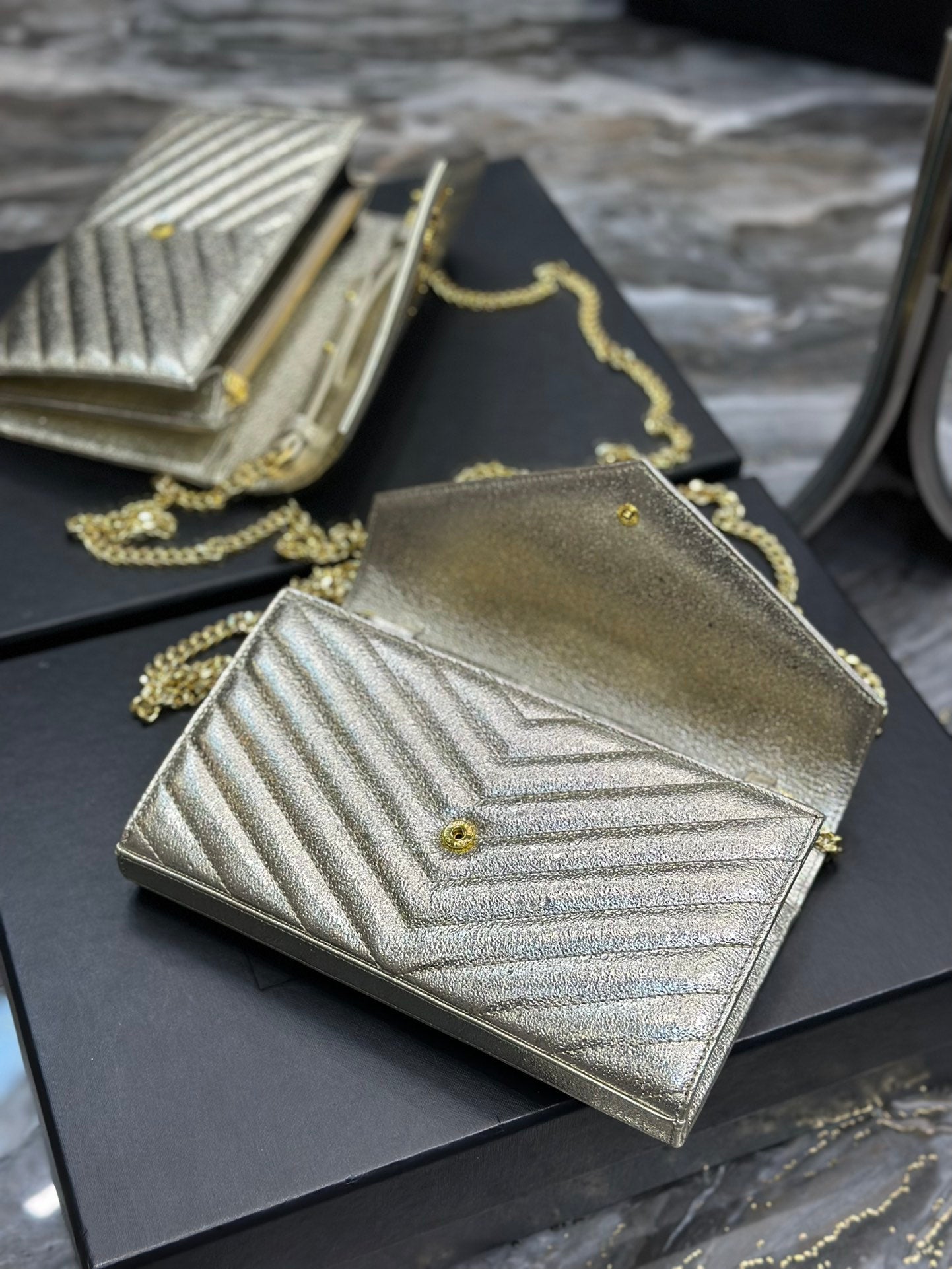 Saint Laurent Cassandre Matelassé Chain Wallet in Gold Leather