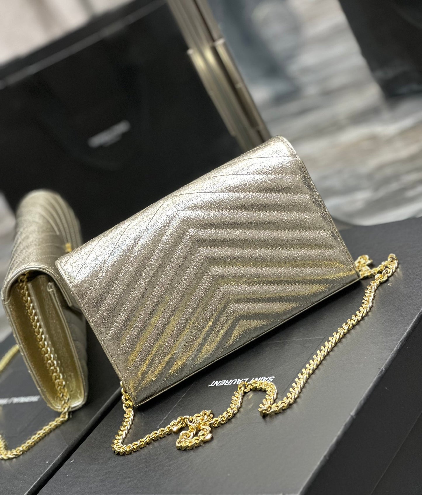 Saint Laurent Cassandre Matelassé Chain Wallet in Gold Leather