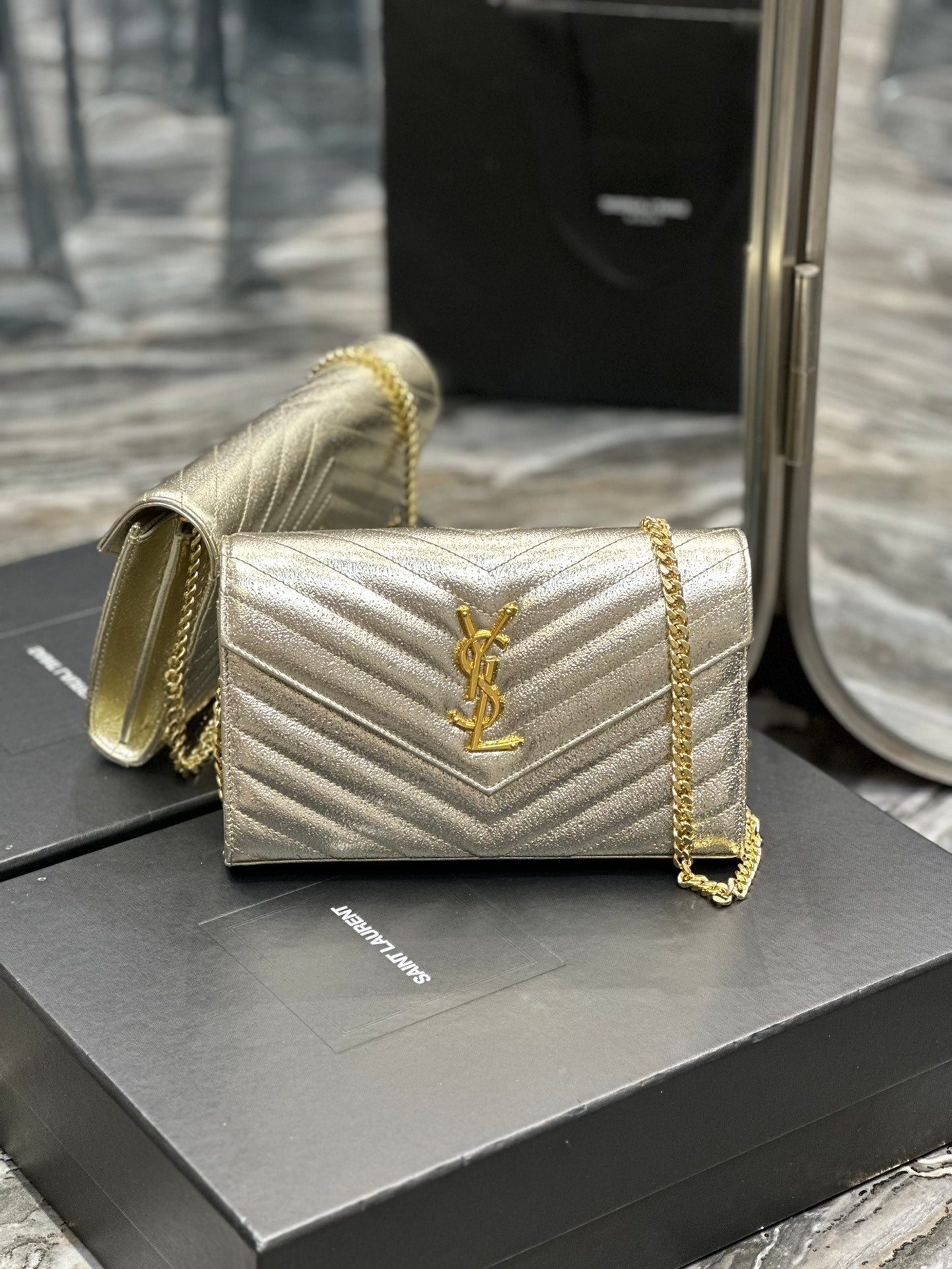 Saint Laurent Cassandre Matelassé Chain Wallet in Gold Leather