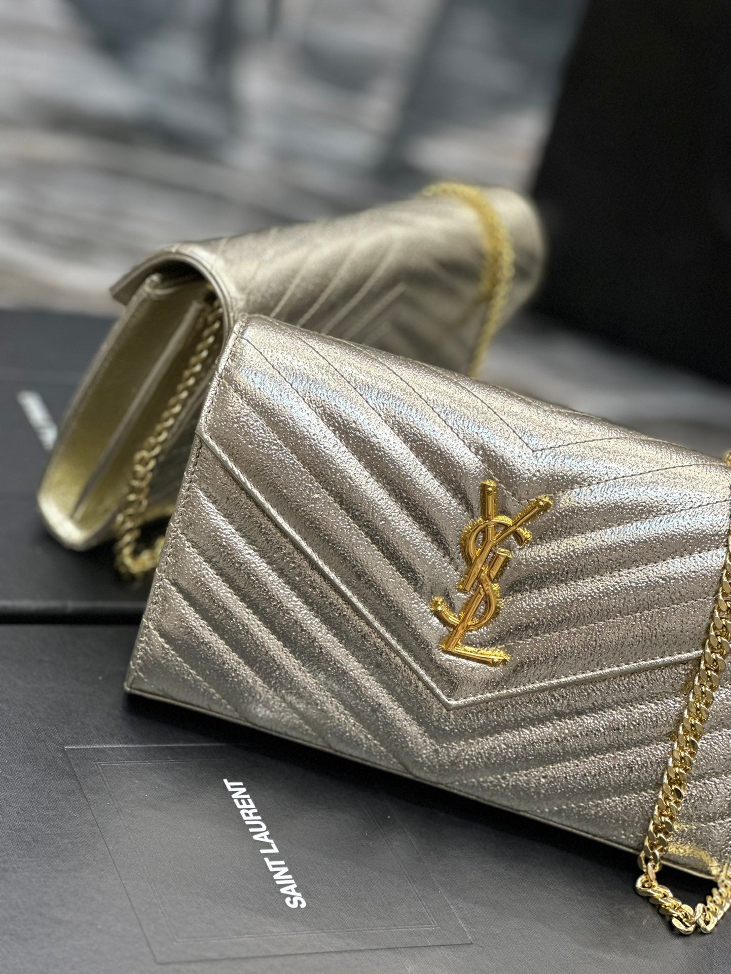 Saint Laurent Cassandre Matelassé Chain Wallet in Gold Leather