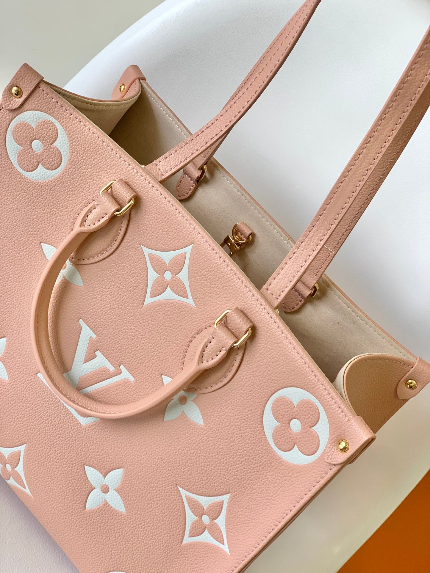 Louis Vuitton Onthego MM Monogram Empreinte Leather Tote Bag - Pink