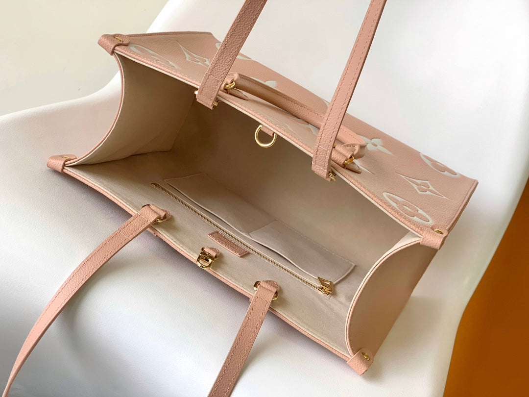 Louis Vuitton Onthego MM Monogram Empreinte Leather Tote Bag - Pink