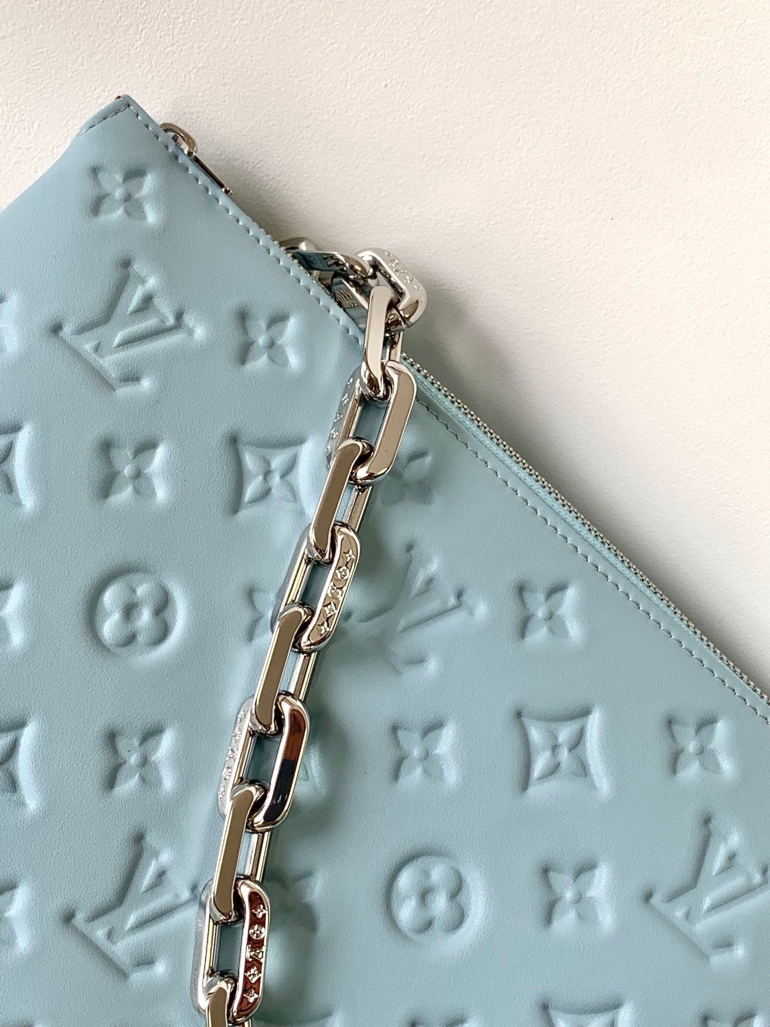 Light Blue Embossed Monogram Leather Crossbody Bag with Silver Chain Strap