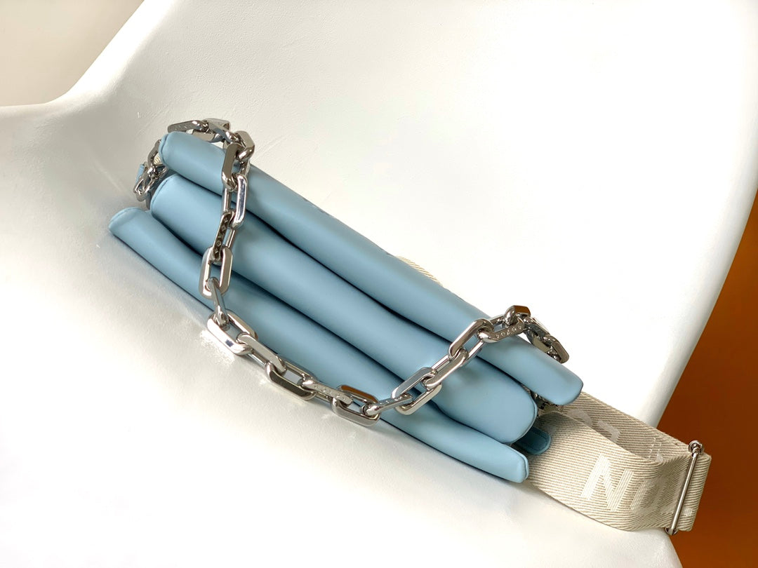 Light Blue Embossed Monogram Leather Crossbody Bag with Silver Chain Strap