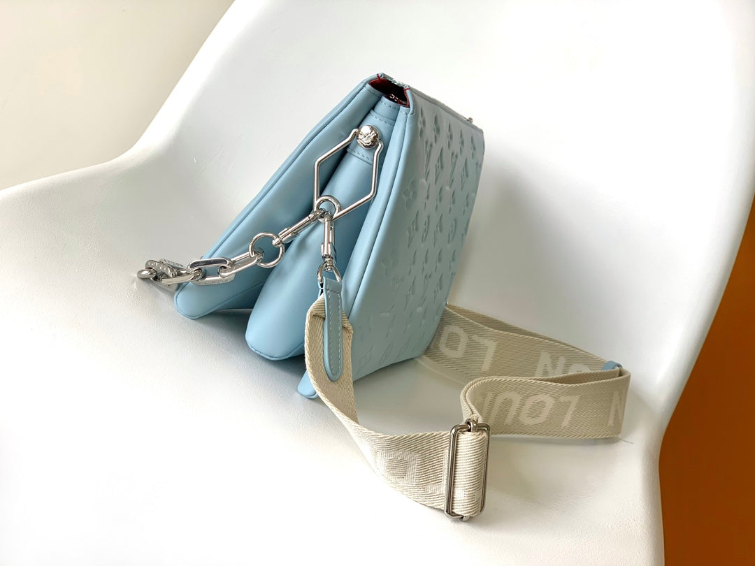 Light Blue Embossed Monogram Leather Crossbody Bag with Silver Chain Strap
