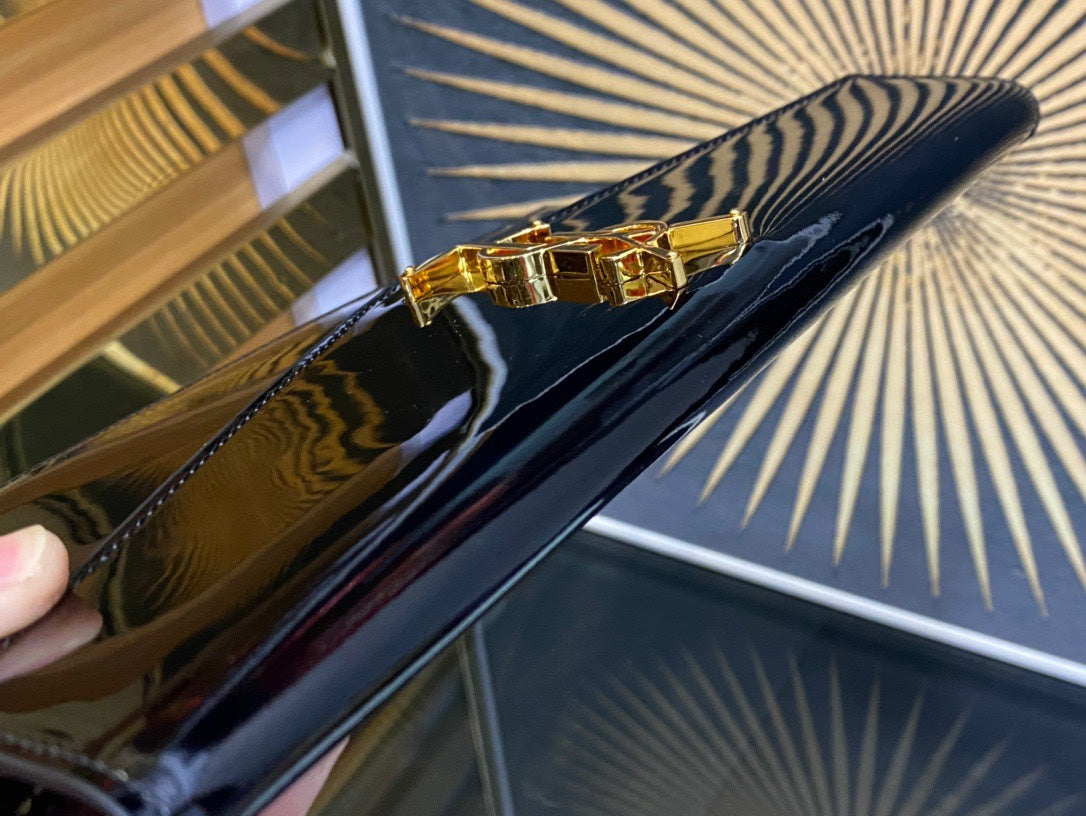 Saint Laurent Uptown Pouch in Black Patent Leather with Gold Logo
