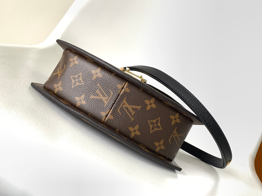 Louis Vuitton Tilcit Handbag Monogram and Monogram Reverse Canvas