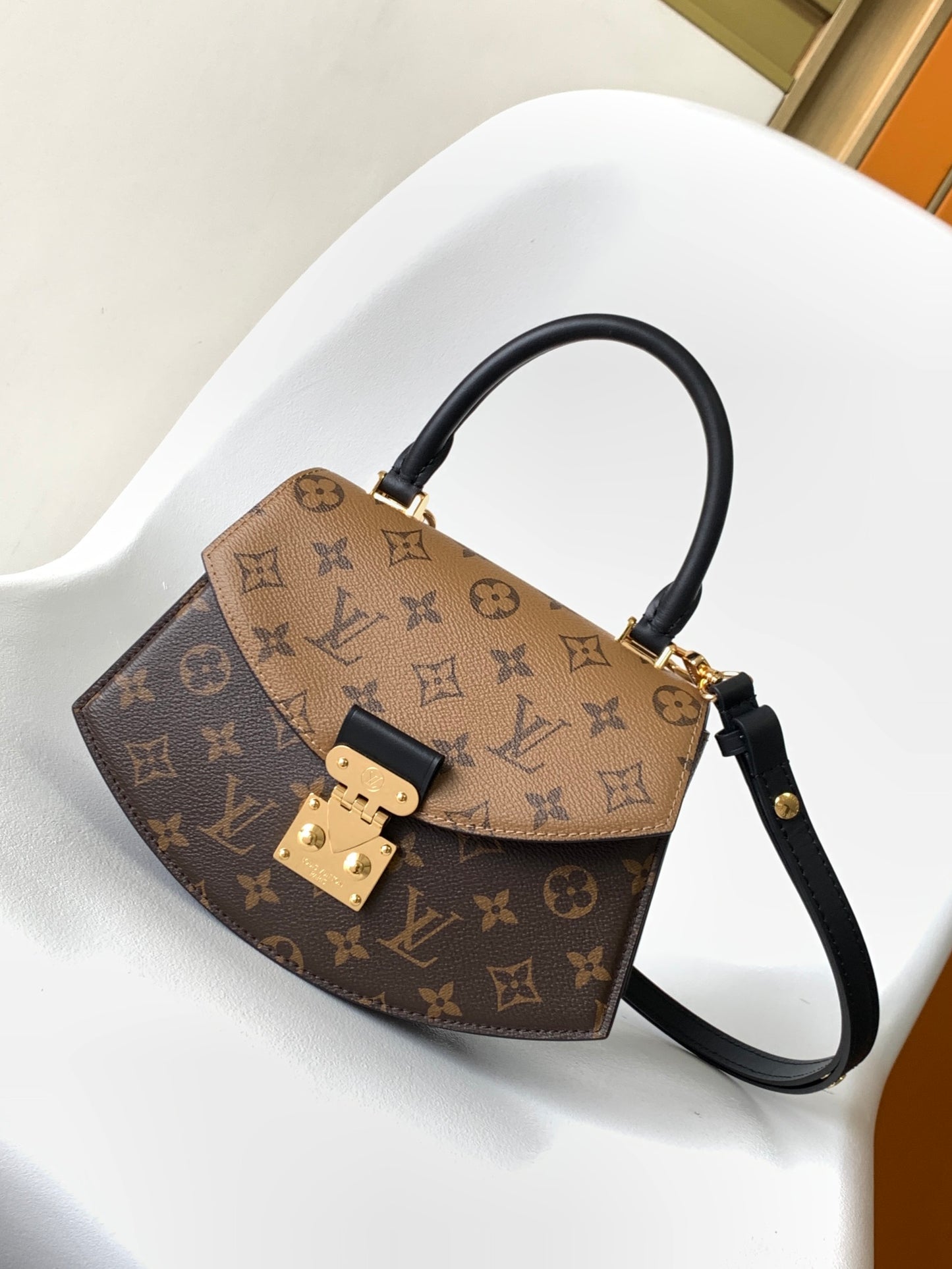 Louis Vuitton Tilcit Handbag Monogram and Monogram Reverse Canvas