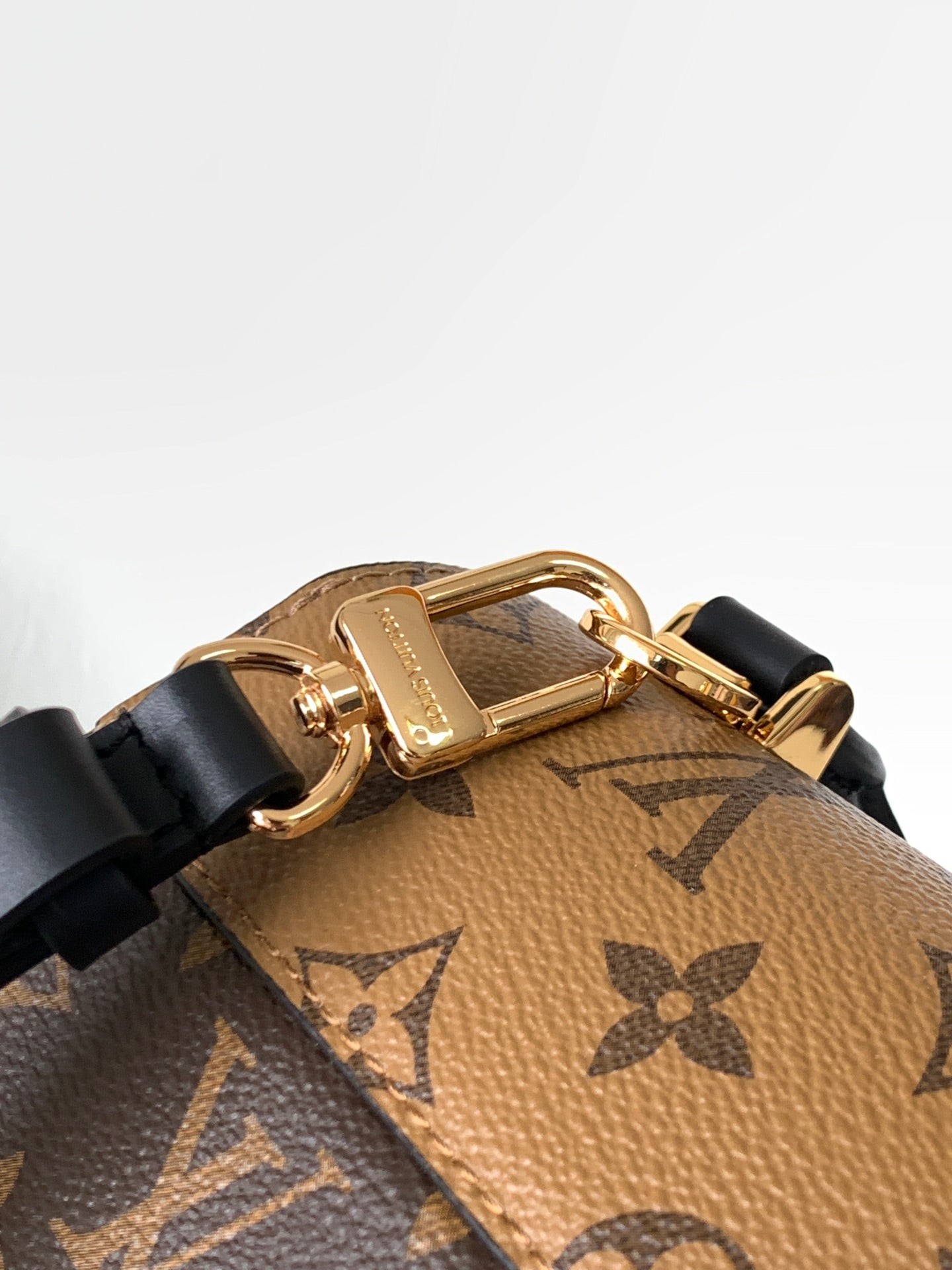 Louis Vuitton Tilcit Handbag Monogram and Monogram Reverse Canvas