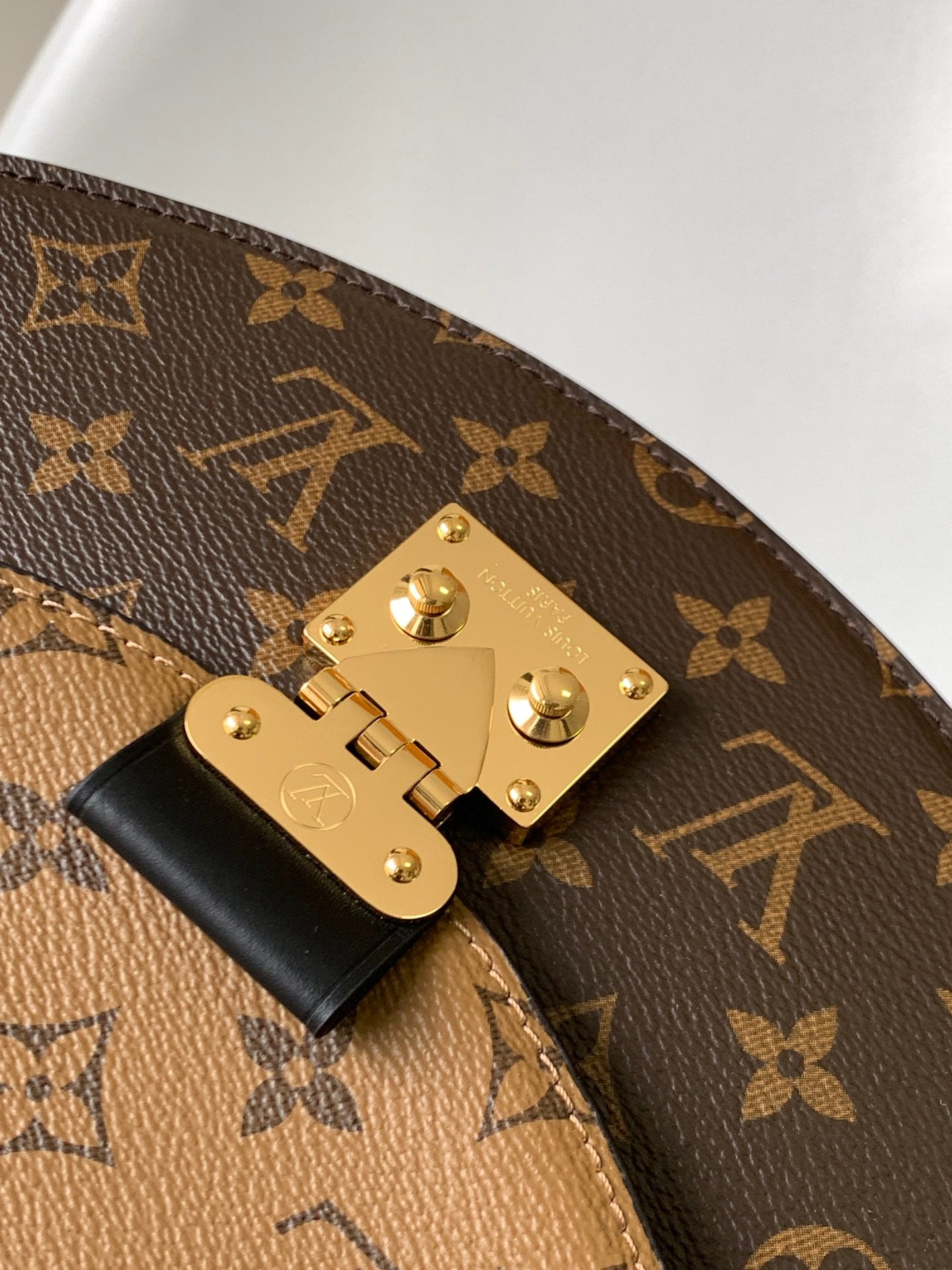 Louis Vuitton Tilcit Handbag Monogram and Monogram Reverse Canvas