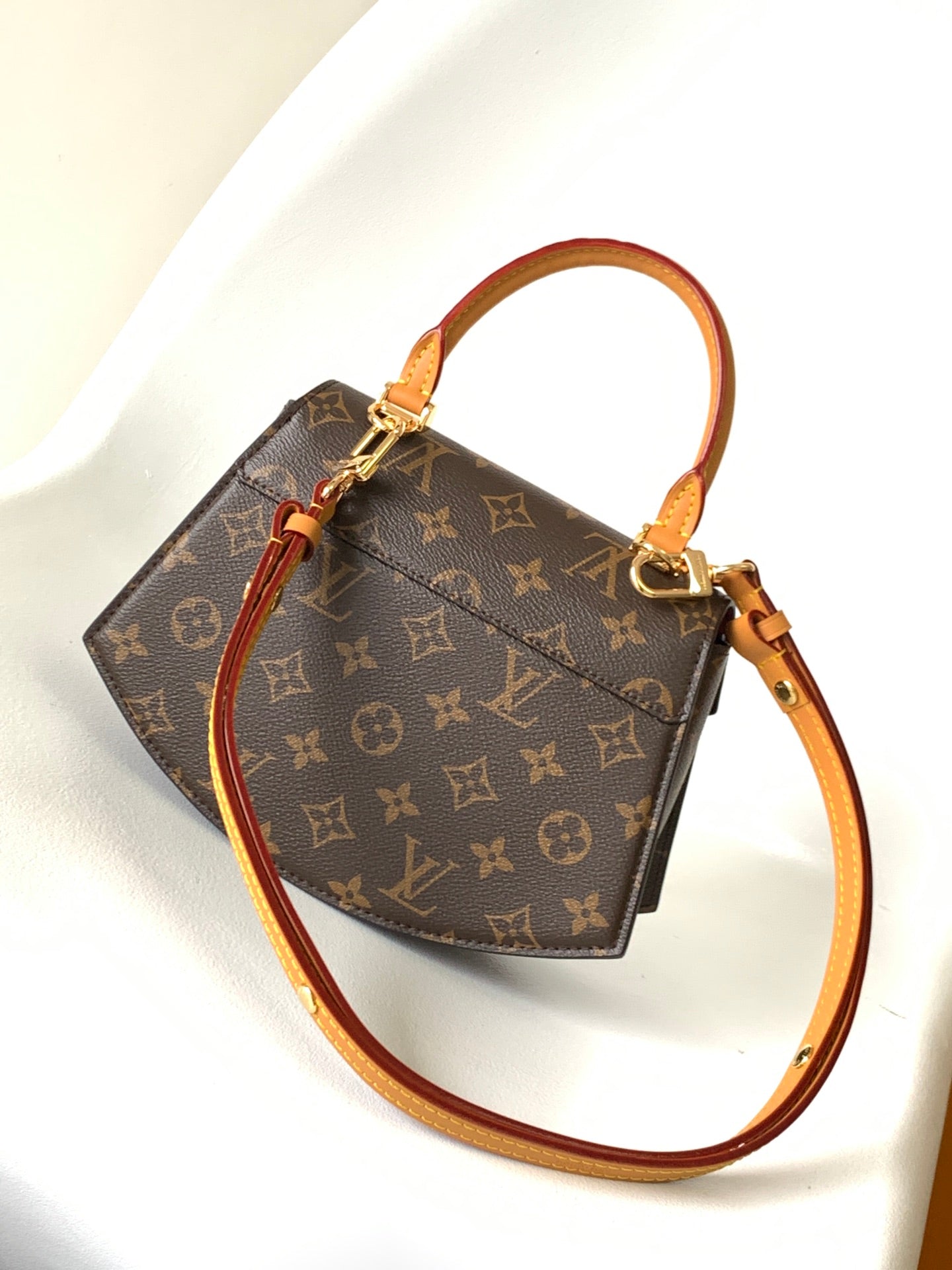 Louis Vuitton Tilcit Monogram Canvas Handbag - Brown
