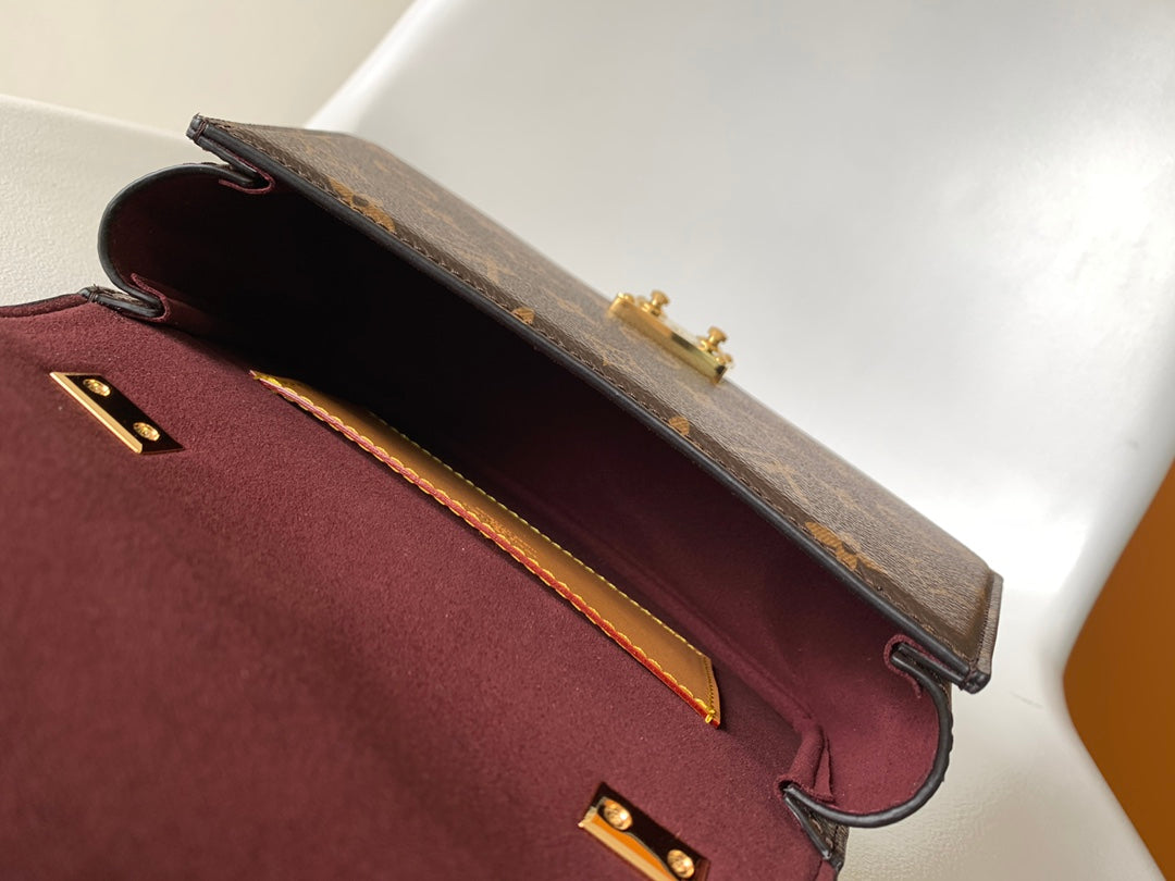Louis Vuitton Tilcit Monogram Canvas Handbag - Brown