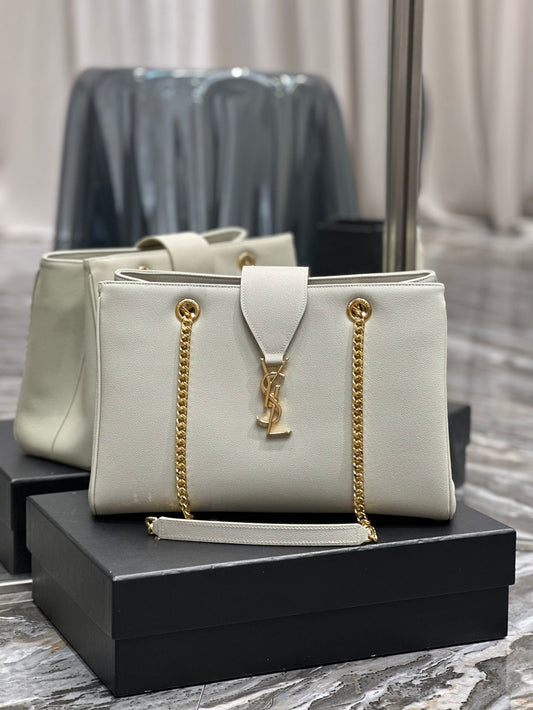 Luxury Off-White Leather Shoulder Bag with Gold Chain and Tassel