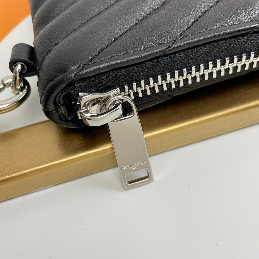 Saint Laurent Monogram Matelassé Quilted Leather Wristlet Clutch in Black
