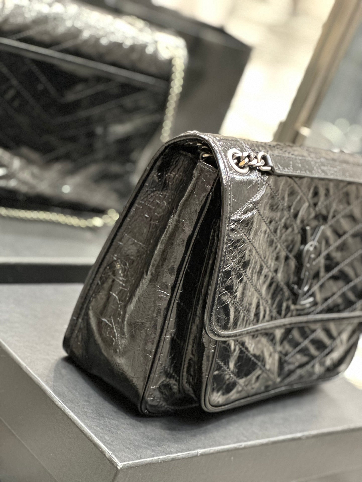Saint Laurent Niki Medium Shoulder Bag in Black Crinkled Vintage Leather