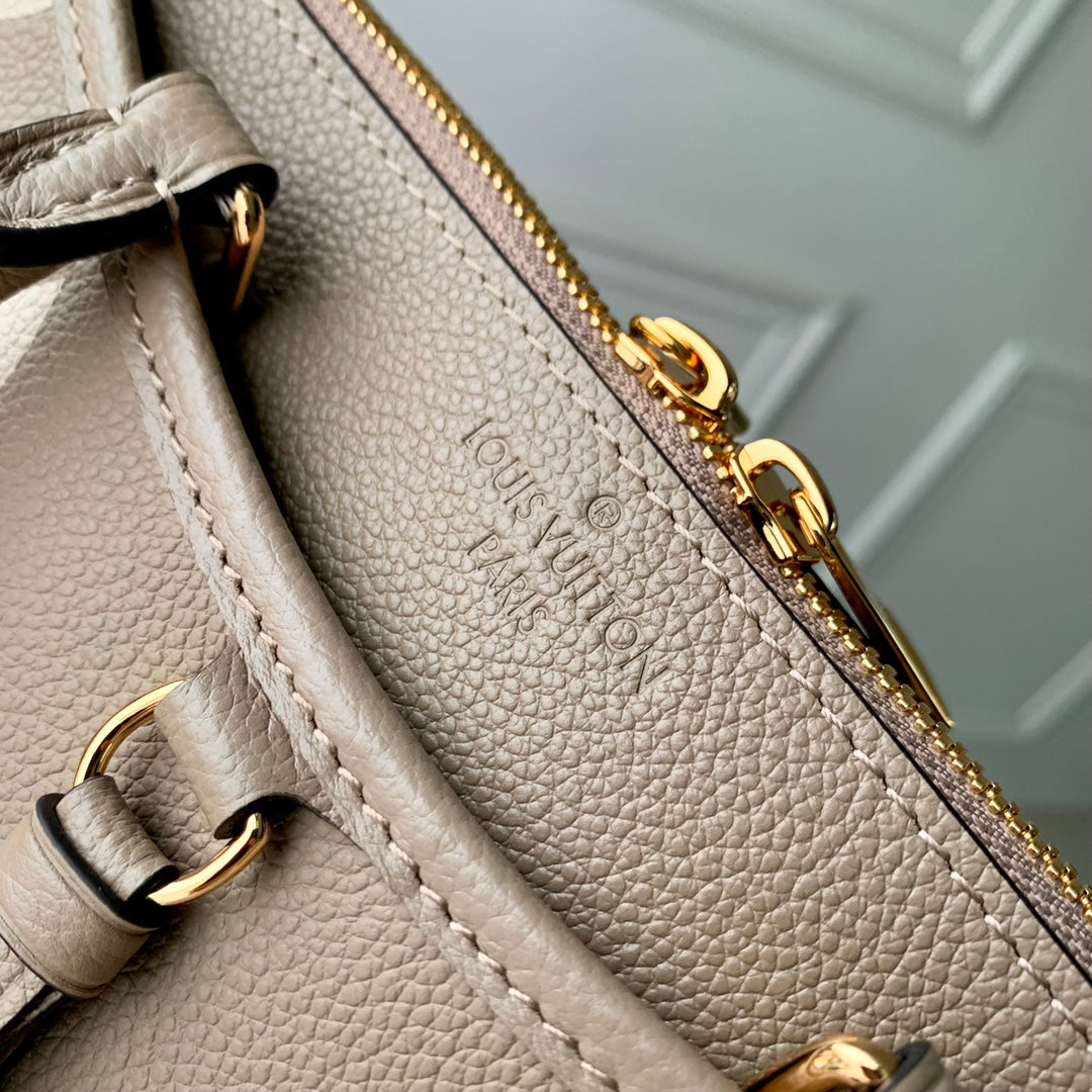 Louis Vuitton Madeleine MM Monogram Empreinte Giant Bicolor Leather Handbag - Turtledove/Cream
