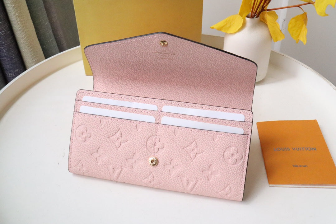 Louis Vuitton Sarah Wallet Monogram Empreinte Leather Light Pink