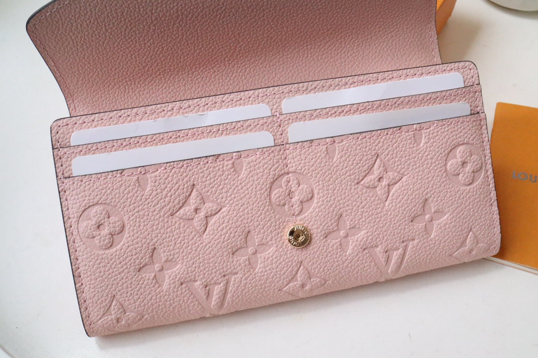 Louis Vuitton Sarah Wallet Monogram Empreinte Leather Light Pink